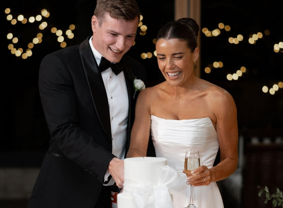 Couple Cutting Cake at Balmoral
